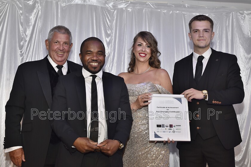 DAL6279 
 Peterborough Community Business Awards at the Marriott Hotel. Sponsor Iain Forsythe with winners the Dominion Christian Centre and the Bobby Copping Foundation