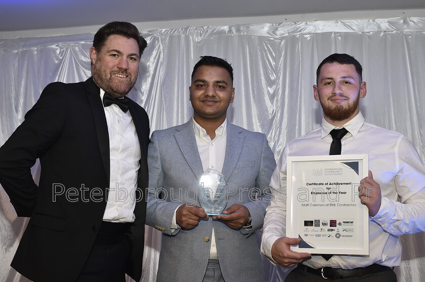 DAL6204 
 Peterborough Community Business Awards at the Marriott Hotel. Employee of the year Tom Hennessy CEO of Opportunity Peterborough with Subash Kadel and Matt Coleman